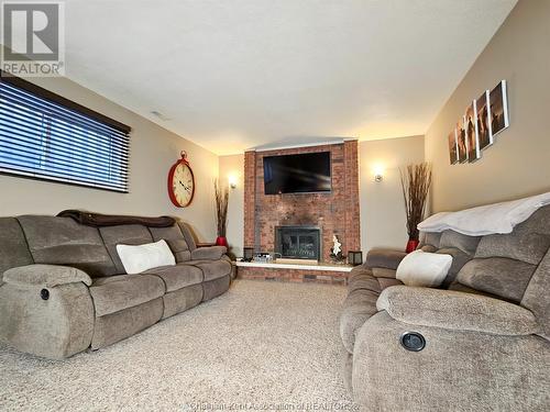 56 Collegiate Drive, Chatham, ON - Indoor Photo Showing Living Room With Fireplace