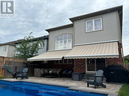 63 Buxton Lane, Clarington, ON - Outdoor With In Ground Pool With Exterior