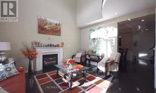 63 Buxton Lane, Clarington, ON - Indoor Photo Showing Living Room With Fireplace