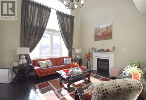 63 Buxton Lane, Clarington, ON - Indoor Photo Showing Living Room With Fireplace