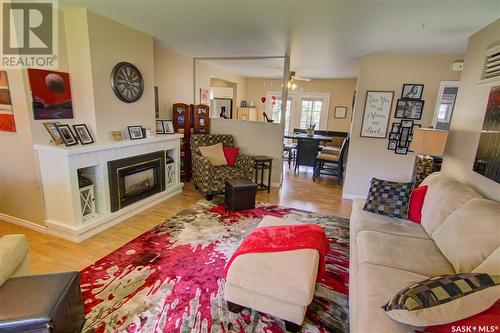 1114 13Th Avenue Nw, Moose Jaw, SK - Indoor Photo Showing Living Room With Fireplace