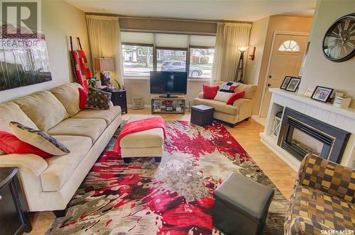 1114 13Th Avenue Nw, Moose Jaw, SK - Indoor Photo Showing Living Room With Fireplace