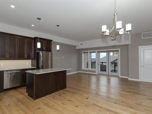 214 200 Oasis Lane N, Thunder Bay, ON - Indoor Photo Showing Kitchen With Upgraded Kitchen