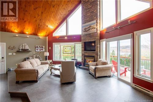 63 Kenneth Drive, Quispamsis, NB - Indoor Photo Showing Living Room With Fireplace