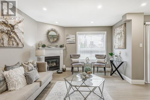 14 Candlebrook Drive, Whitby, ON - Indoor Photo Showing Living Room With Fireplace