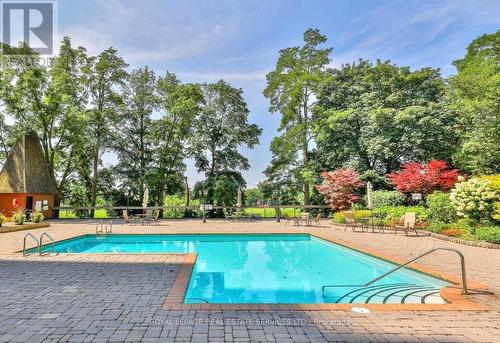 608 - 1400 Dixie Road, Mississauga, ON - Outdoor With In Ground Pool With Backyard