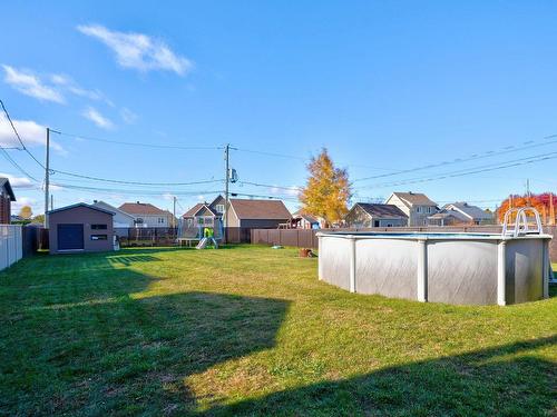 Backyard - 831 Rue Vendôme, Saint-Paul, QC - Outdoor With Above Ground Pool With Backyard