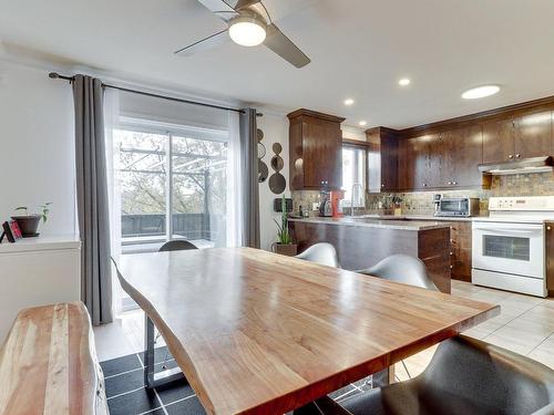 Kitchen - 7440 Rue Angèle, Laval (Duvernay), QC - Indoor Photo Showing Other Room