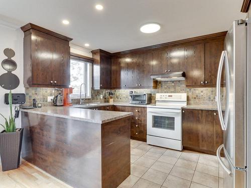 Kitchen - 7440 Rue Angèle, Laval (Duvernay), QC - Indoor Photo Showing Kitchen