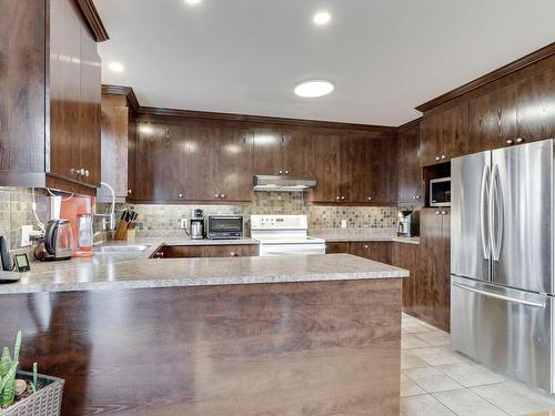 Kitchen - 7440 Rue Angèle, Laval (Duvernay), QC - Indoor Photo Showing Kitchen