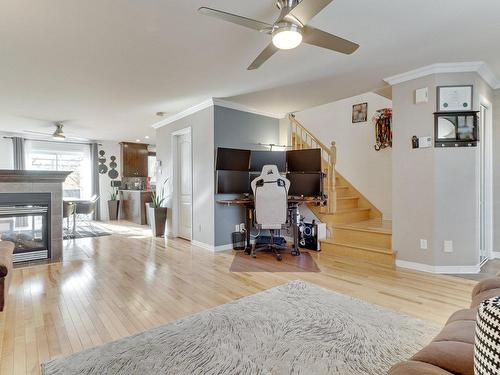 Interior - 7440 Rue Angèle, Laval (Duvernay), QC - Indoor Photo Showing Living Room With Fireplace