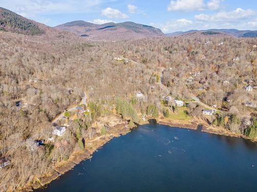 Photo aÃ©rienne - 207 Ch. Du Lac N., Stoneham-Et-Tewkesbury, QC - Outdoor With Body Of Water With View