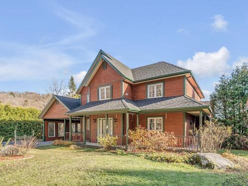 FaÃ§ade - 207 Ch. Du Lac N., Stoneham-Et-Tewkesbury, QC - Outdoor With Deck Patio Veranda With Facade