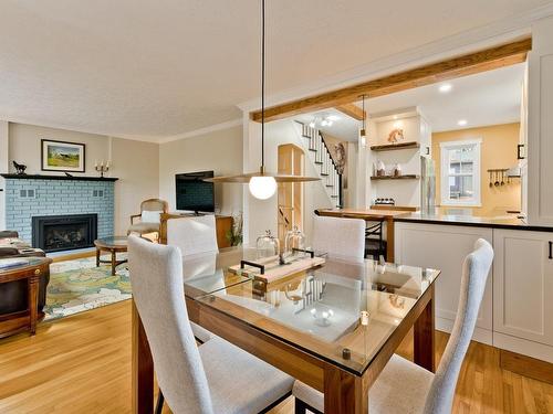 Dining room - 15 Rue Fraser, Windsor, QC - Indoor Photo Showing Dining Room With Fireplace