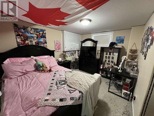 4403 Heritage Crescent, Fort Nelson, BC - Indoor Photo Showing Bedroom