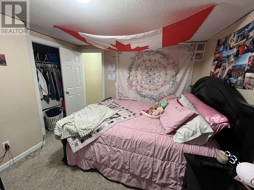 4403 Heritage Crescent, Fort Nelson, BC - Indoor Photo Showing Bedroom