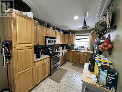 4403 Heritage Crescent, Fort Nelson, BC - Indoor Photo Showing Kitchen