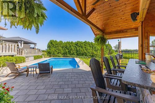 8819 Longwoods Road, Strathroy-Caradoc (Mount Brydges), ON - Outdoor With In Ground Pool With Deck Patio Veranda With Exterior