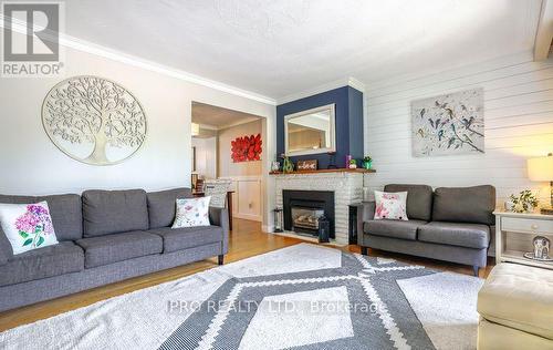 12 Westdale Avenue, Orangeville, ON - Indoor Photo Showing Living Room With Fireplace