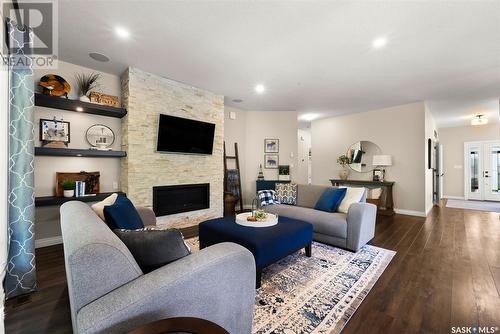 101 Motherwell Drive, White City, SK - Indoor Photo Showing Living Room With Fireplace