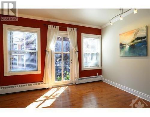 Large windows in living room - 139 Guigues Avenue Unit#1, Ottawa, ON - Indoor Photo Showing Other Room