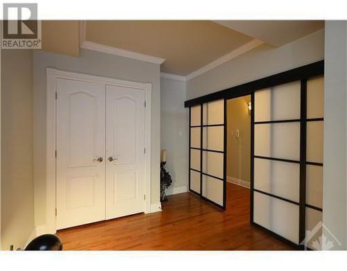 Bedroom #2 with sliding frosted doors - 139 Guigues Avenue Unit#1, Ottawa, ON - Indoor Photo Showing Other Room