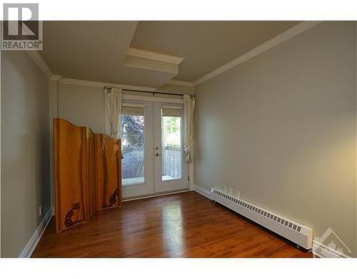 Primary Bedroom with door leading to back deck - 139 Guigues Avenue Unit#1, Ottawa, ON - Indoor Photo Showing Other Room