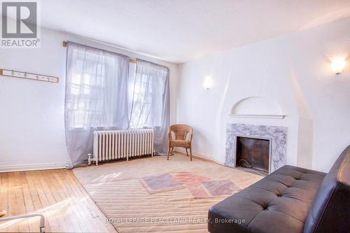 32 Strathgowan Avenue, Toronto, ON - Indoor Photo Showing Other Room With Fireplace