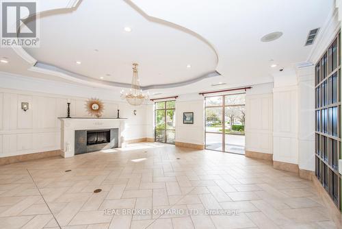 1610 - 710 Humberwood Boulevard, Toronto, ON - Indoor With Fireplace