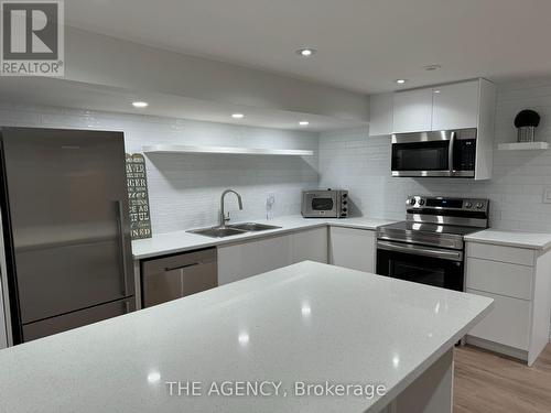 Bsmt - 1486 Rometown Drive, Mississauga, ON - Indoor Photo Showing Kitchen With Double Sink