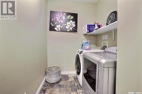 8013 Edgewater Bay, Regina, SK - Indoor Photo Showing Laundry Room