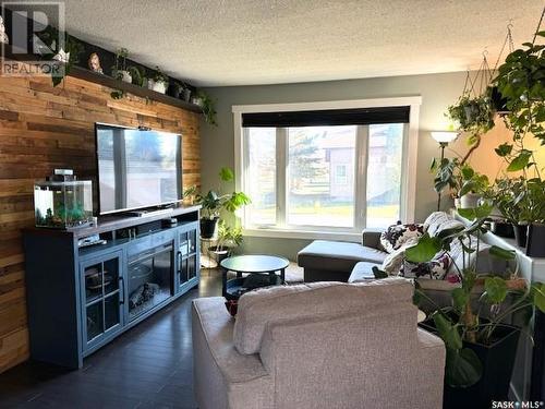 11345 Clark Drive, North Battleford, SK - Indoor Photo Showing Living Room With Fireplace