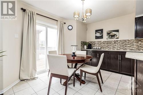 Eating area with patio doors to Huge deck! - 26 Portadown Crescent, Ottawa, ON - Indoor Photo Showing Dining Room