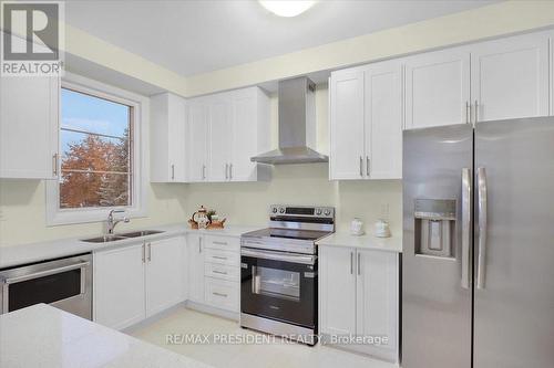 21 Tyler Avenue, Erin, ON - Indoor Photo Showing Kitchen With Double Sink