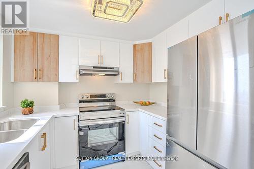 907 - 4235 Sherwoodtowne Boulevard, Mississauga, ON - Indoor Photo Showing Kitchen With Double Sink