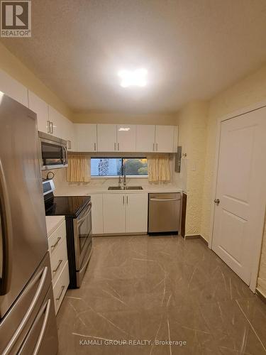 727 - 4645 Jane Street, Toronto, ON - Indoor Photo Showing Kitchen With Double Sink