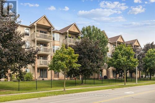 305 - 4005 Kilmer Drive, Burlington, ON - Outdoor With Balcony With Facade