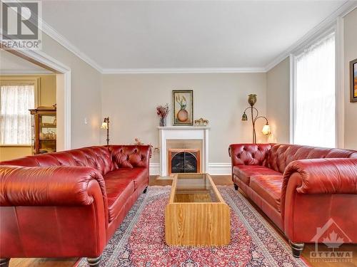 37 Charles Street, Ottawa, ON - Indoor Photo Showing Living Room With Fireplace