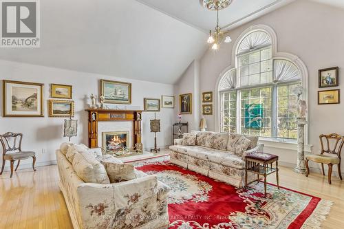 4 Sturgeon Glen Road, Kawartha Lakes (Fenelon Falls), ON - Indoor Photo Showing Living Room With Fireplace