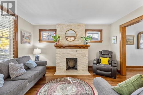 1225 Chilver, Windsor, ON - Indoor Photo Showing Living Room With Fireplace