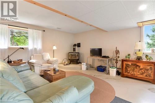 Downstairs living room- propane fireplace. - 58 County Road 40 Road, Athens, ON - Indoor Photo Showing Other Room