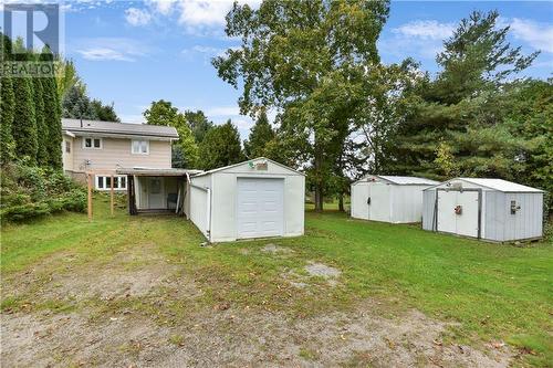 Attached carport, garage, 2 outbuildings. - 58 County Road 40 Road, Athens, ON - Outdoor With Backyard