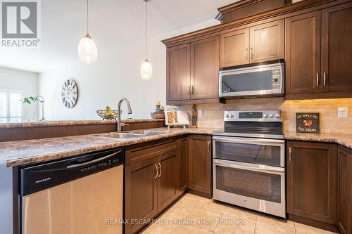 39 - 310 Southbrook Drive, Hamilton, ON - Indoor Photo Showing Kitchen With Double Sink