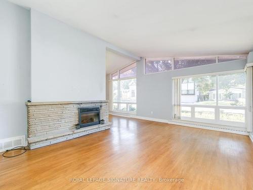 21 Palomino Cres, Toronto, ON - Indoor Photo Showing Living Room With Fireplace