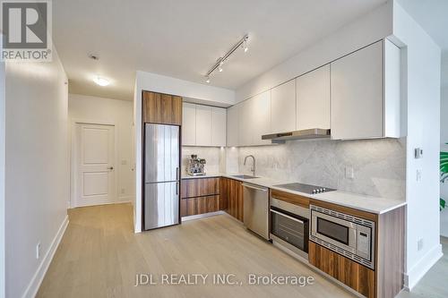 217 - 7 Kenaston Gardens, Toronto, ON - Indoor Photo Showing Kitchen With Upgraded Kitchen