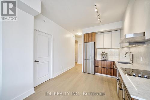 217 - 7 Kenaston Gardens, Toronto, ON - Indoor Photo Showing Kitchen With Upgraded Kitchen