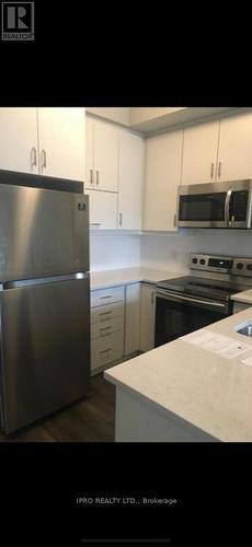 234 - 128 Grovewood Common Circle, Oakville, ON - Indoor Photo Showing Kitchen