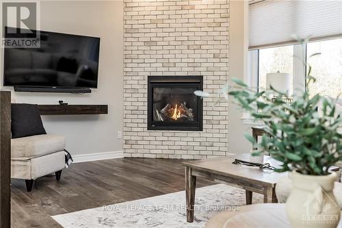 541 Osmond Daley Drive, Ottawa, ON - Indoor Photo Showing Living Room With Fireplace