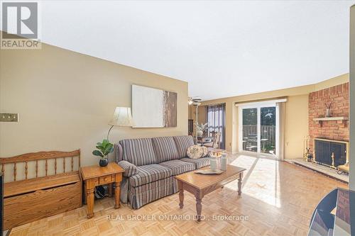 18 - 2655 Gananoque Drive, Mississauga, ON - Indoor Photo Showing Living Room With Fireplace