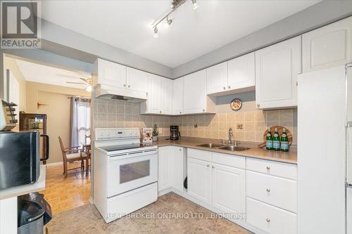 18 - 2655 Gananoque Drive, Mississauga, ON - Indoor Photo Showing Kitchen With Double Sink